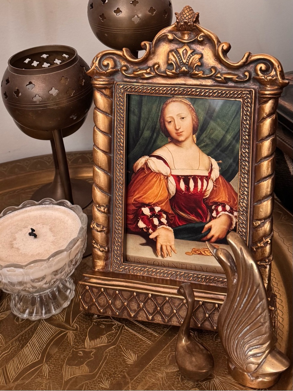 Renaissance portrait in antique inspired gilded frame.